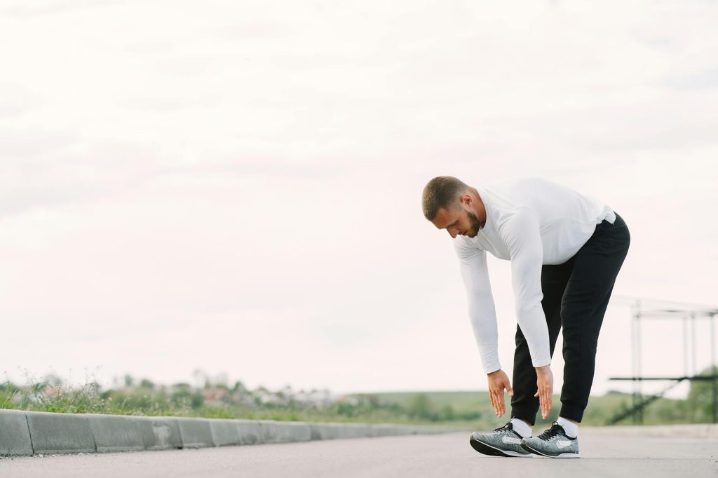 Foto profissional grátis de ação, activewear, alongamento